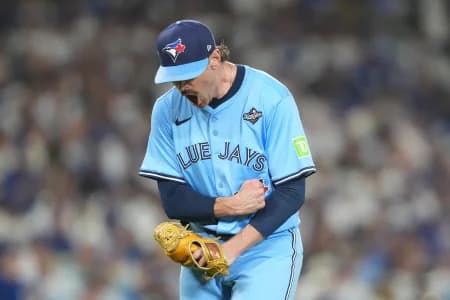 Toronto Blue Jays pitcher Shane Bieber (57) reacts in the fifth inning against the Los Angeles Dodgers during game four of the 2025 MLB World Series at Dodger Stadium.