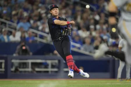 Toronto Blue Jays third baseman Kazuma Okamoto (7) throws out Pittsburgh Pirates left fielder Jake Mangum (28) at first base during the fifth inning at Rogers Centre.
