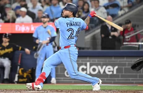 Toronto Blue Jays left fielder Yohendrick Pinango (24) hits a single against the Pittsburgh Pirates in the sixth inning at Rogers Centre.