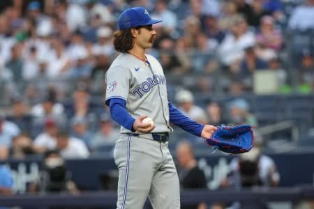 Toronto Blue Jays starting pitcher Dylan Cease (84) gestures to home plate after a pitch in the first inning against the New York Yankees at Yankee Stadium.