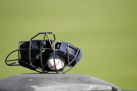 A detailed view of a catchers mask and baseball as pitchers and catchers report for spring training at George M. Steinbrenner Field.