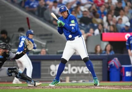 Toronto Blue Jays designated hitter George Springer (4) is hit with a pitch against the Miami Marlins during the fifth inning at the Rogers Centre.