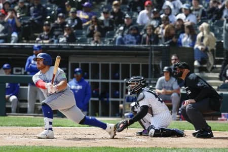 Toronto Blue Jays catcher Alejandro Kirk (30) hits an RBI-double against the Chicago White Sox during the second inning at Rate Field.