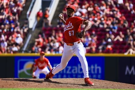 Cincinnati Reds relief pitcher Yosver Zulueta (67) pitches against the Toronto Blue Jays in the ninth inning at Great American Ball Park.