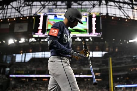 Seattle Mariners right fielder Rhylan Thomas (31) walks on to the field before his first major league at bat during the second inning against the Texas Rangers at Globe Life Field.