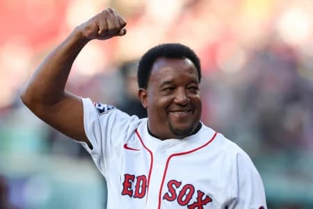 Former Boston Red Sox player Pedro Martinez waves to the crowd prior to a game between the Boston Red Sox and the Tampa Bay Rays at Fenway Park.