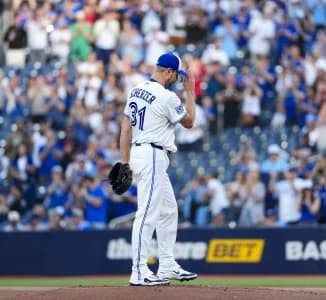 Toronto Blue Jays pitcher Max Scherzer (31) celebrates his career 3500th strike out against the Philadelphia Phillies during the first inning at Rogers Centre