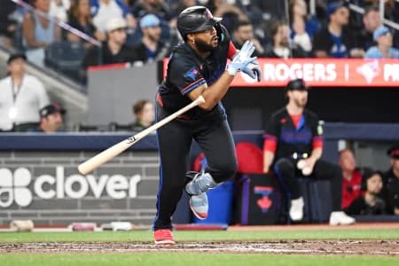 Toronto Blue Jays first baseman Vladimir Guerrero Jr. (27) hits a two RBI single against the Texas Rangers in the eighth inning at Rogers Centre.