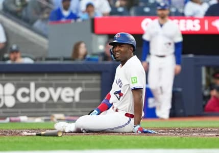 Toronto Blue Jays right fielder Jesus Sanchez (12) ends up on the ground after trying to avoid a pitch against the Houston Astros during the third inning at Rogers Centre.