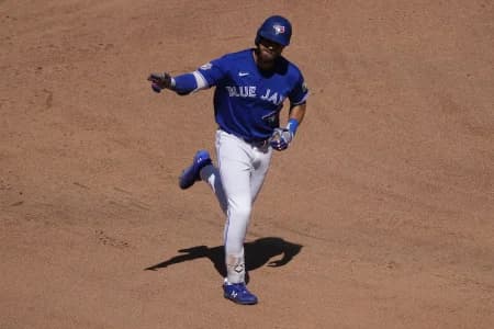 Toronto Blue Jays right fielder Nathan Lukes (38) waves to the fans as he rounds the bases on his two run home run against the Texas Rangers during the eighth inning at Rogers Centre.