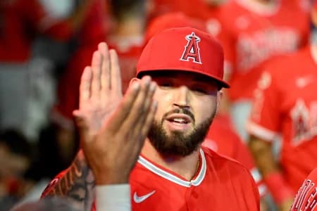 Los Angeles Angels relief pitcher Alek Manoah (47) is greeted by teammates in the dugout after pitching the eighth inning against the Toronto Blue Jays at Rogers Centre.
