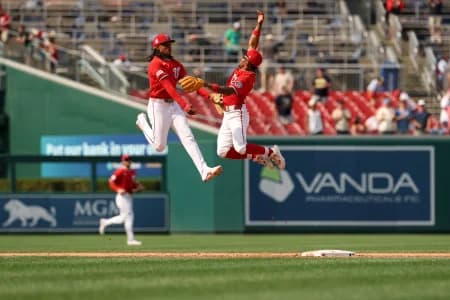 Washington Nationals shortstop CJ Abrams (5) and Nationals second baseman Nasim Nuñez (26) celebrate after the final out against the Arizona Diamondbacks at Nationals Park.