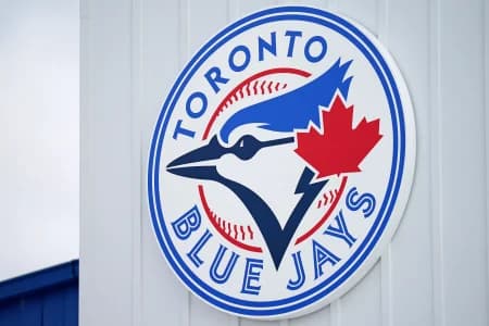 A detailed view of the Toronto Blue Jays logo on a building at TD Ballpark during the spring training game between the Toronto Blue Jays and the Philadelphia Phillies