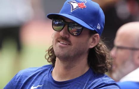 Toronto Blue Jays pitcher Kevin Gausman (34) in the dug out during the second inning against the Chicago White Sox at Rogers Centre.