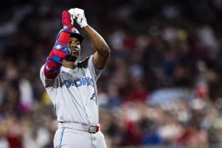 Toronto Blue Jays right fielder Jesus Sanchez (12) reacts on second base after hitting a double in the seventh inning against the Boston Red Sox at Fenway Park