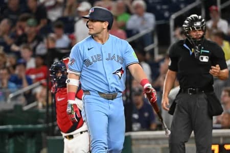 Toronto Blue Jays center fielder Daulton Varsho (5) reacts after striking out against the Washington Nationals during the second inning at Nationals Park.