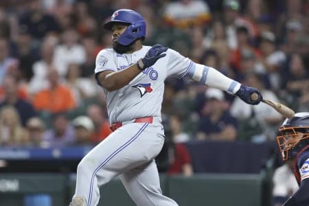 Toronto Blue Jays first baseman Vladimir Guerrero Jr. (27) bats during the third inning against the Houston Astros at Daikin Park.