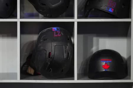 The City Connect helmet of Toronto Blue Jays first baseman Vladimir Guerrero Jr. (27) rests in the dugout before a MLB game against the Cleveland Guardians at Rogers Centre.