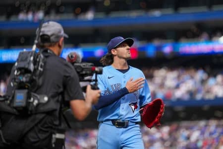 Toronto Blue Jays pitcher Kevin Gausman (34) applauds the fans after being taken out of the game during the sixth inning against the St. Louis Cardinals at Rogers Centre.