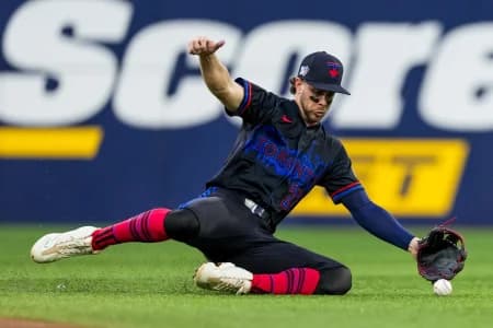 Toronto Blue Jays second baseman Ernie Clement (22) attempts to field the ball against the St. Louis Cardinals during the fifth inning at Rogers Centre