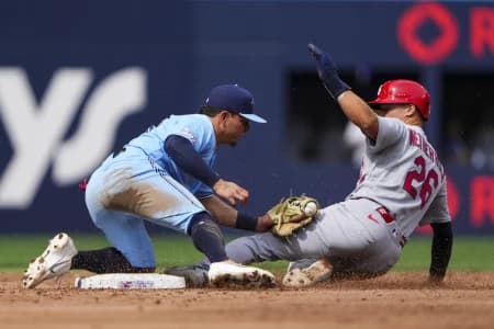 Toronto Blue Jays second baseman Luis Urías (48) tags out St. Louis Cardinals second baseman JJ Wetherholt (26) during the fifth inning at second base at Rogers Centre.