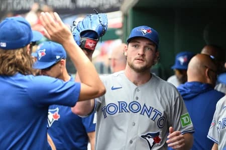 Toronto Blue Jays pitcher Trey Yesavage (39) is congratulated by teammates after leaving the game against the Washington Nationals during the seventh inning at Nationals Park.
