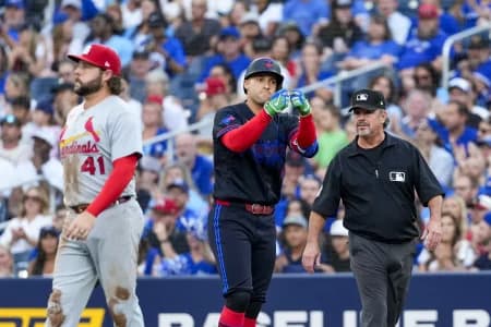 Toronto Blue Jays designated hitter George Springer (4) celebrates hitting a single against the St. Louis Cardinals during the second inning at Rogers Centre