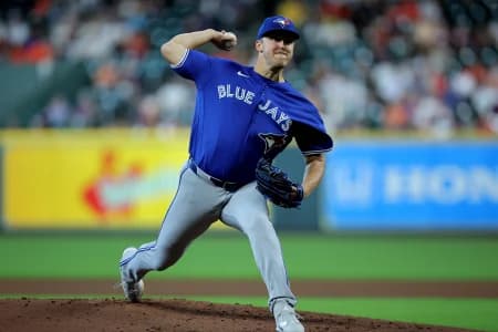 Toronto Blue Jays pitcher Jameson Taillon (56) delivers a pitch against the Houston Astros during the first inning at Daikin Park.