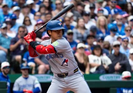 Toronto Blue Jays third baseman Kazuma Okamoto (7) waits for a pitch during an at-bat against the Seattle Mariners at T-Mobile Park.