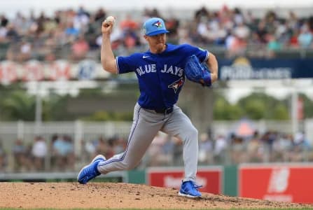 Toronto Blue Jays pitcher Chase Lee (52) throws a pitch during the second inning against the Boston Red Sox at JetBlue Park at Fenway South