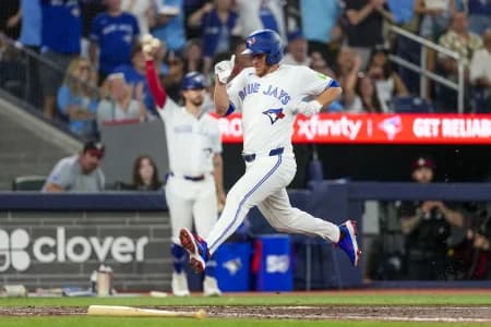 Toronto Blue Jays right fielder Myles Straw (3) scores against the Boston Red Sox during the fifth inning at Rogers Centre.