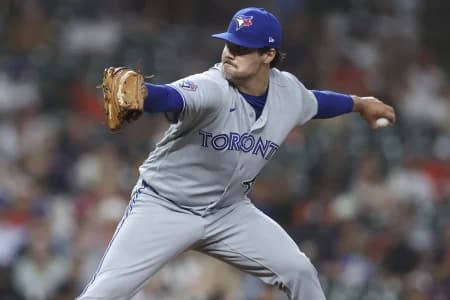 Toronto Blue Jays pitcher Brendon Little (54) delivers a pitch during the eighth inning against the Houston Astros at Daikin Park.