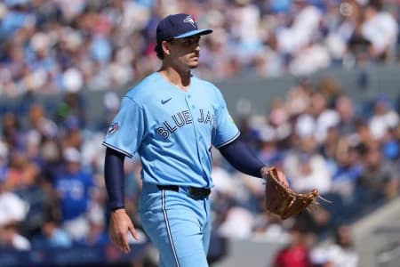 Toronto Blue Jays relief pitcher Ricky Tiedemann (33) walks back to the dugout against the New York Yankees during the second inning at Rogers Centre.