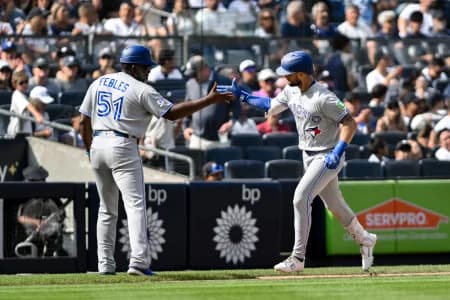 Toronto Blue Jays right fielder Nathan Lukes (38) rounds the bases after hitting a solo home run against the New York Yankees during the eighth inning at Yankee Stadium