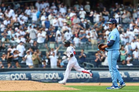 Toronto Blue Jays pitcher Brendon Little (54) reacts after New York Yankees second baseman Jazz Chisholm Jr. (13) rounds the bases after a two run home run during the seventh inning at Yankee Stadium.