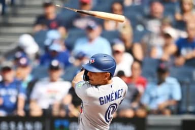 Toronto Blue Jays shortstop Andres Gimenez (0) breaks his bat during the seventh inning against the Cleveland Guardians at Progressive Field.