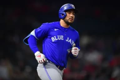 Toronto Blue Jays right fielder Anthony Santander (25) hits a solo home run against the Los Angeles Angels during the eighth inning at Angel Stadium