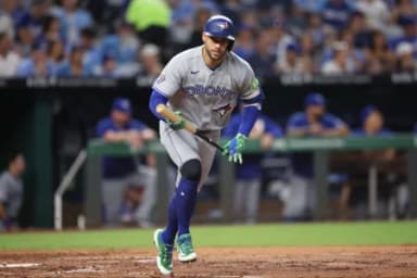 Toronto Blue Jays designated hitter George Springer (4) reacts during an at bat during the fourth inning against the Kansas City Royals at Kauffman Stadium.