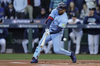 Toronto Blue Jays right fielder Anthony Santander (25) strikes out in the first inning against the Seattle Mariners during game three of the ALCS round for the 2025 MLB playoffs at T-Mobile Park.