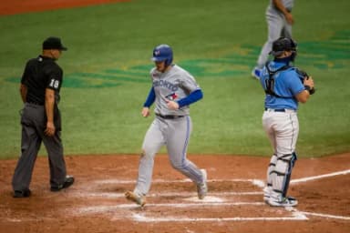 Toronto Blue Jays third baseman Brandon Drury (3) scores during the sixth inning of a game against the Tampa Bay Rays at Tropicana Field