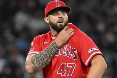 Los Angeles Angels relief pitcher Alek Manoah (47) returns to the dugout after pitching against the Toronto Blue Jays in the eighth inning at Rogers Centre.
