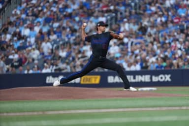 Toronto Blue Jays start pitcher Shane Bieber (57) throws a pitch against the New York Yankees during the first inning at Rogers Centre.
