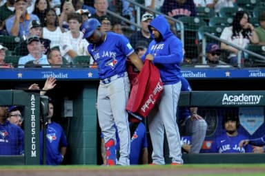 Toronto Blue Jays left fielder Jesus Sanchez (12) is greeted by Toronto Blue Jays first baseman Vladimir Guerrero Jr. (27) after hitting a two-run home run to right field against the Houston Astros during the sixth inning at Daikin Park