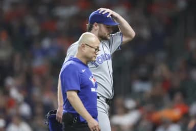 Toronto Blue Jays starting pitcher Trey Yesavage (39) walks off the field after an apparent injury during the third inning against the Houston Astros at Daikin Park.
