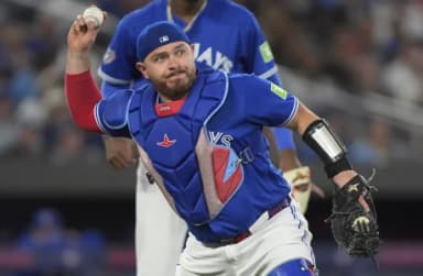 Toronto Blue Jays catcher Alejandro Kirk (30) goes to throw out Detroit Tigers shortstop Kevin McGonigle (not pictured) at first base during the sixth inning at Rogers Centre