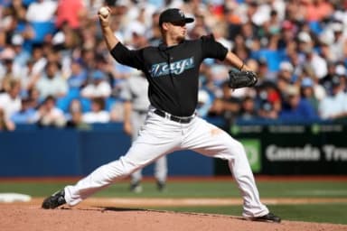 Toronto Blue Jays pitcher Brian Wolfe (40) delivers a pitch against the New York Yankees at the Rogers Centre. The Blue Jays beat the Yankees 14-8.