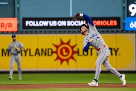 Toronto Blue Jays infielder Ernie Clement (22) catches an infield fly during the eighth inning at Oriole Park at Camden Yards