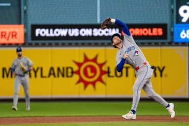Toronto Blue Jays infielder Ernie Clement (22) catches an infield fly during the eighth inning at Oriole Park at Camden Yards