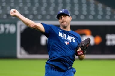 Toronto Blue Jays pitcher Max Scherzer (31) throws pregame at Oriole Park at Camden Yards