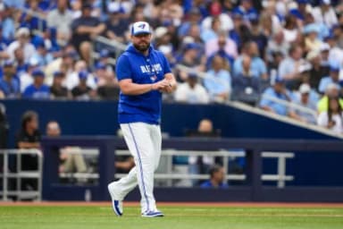 Toronto Blue Jays manager John Schneider (14) walks to the mound during the seventh inning against the Seattle Mariners at Rogers Centre.